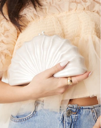 textured pearlecent clutch bag with detatchable chain strap in cream