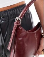 contrast stitch shoulder bag in burgundy