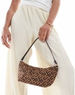 monogram slouch shoulder bag in brown